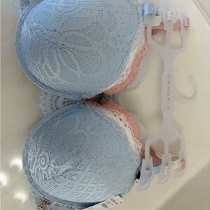 Set of three Danskin Lace Bras in Light Blue, White, and Pink